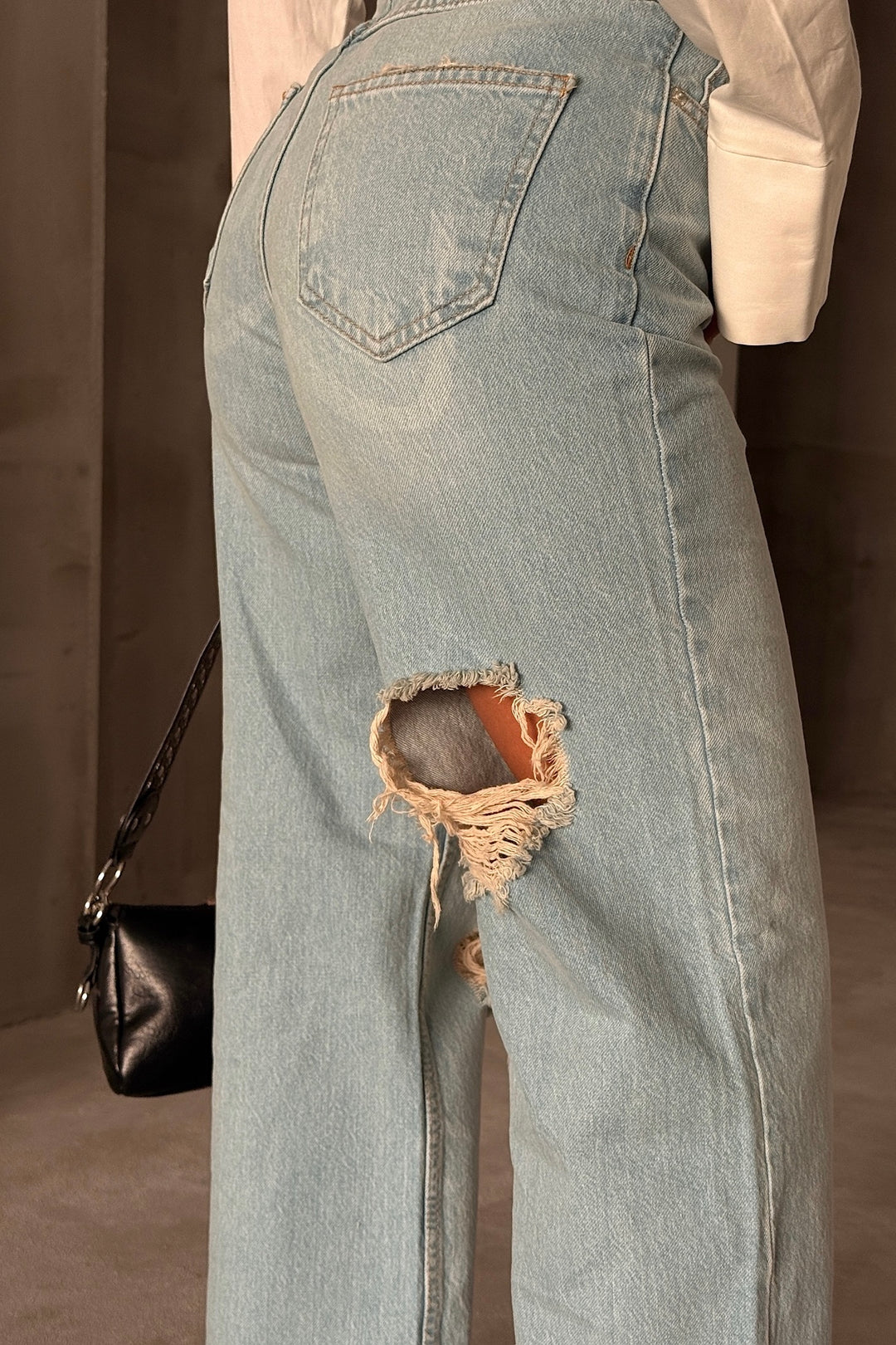 Ripped Bow-Waist Jeans