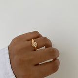 Hands Hugging Crystal Ring
